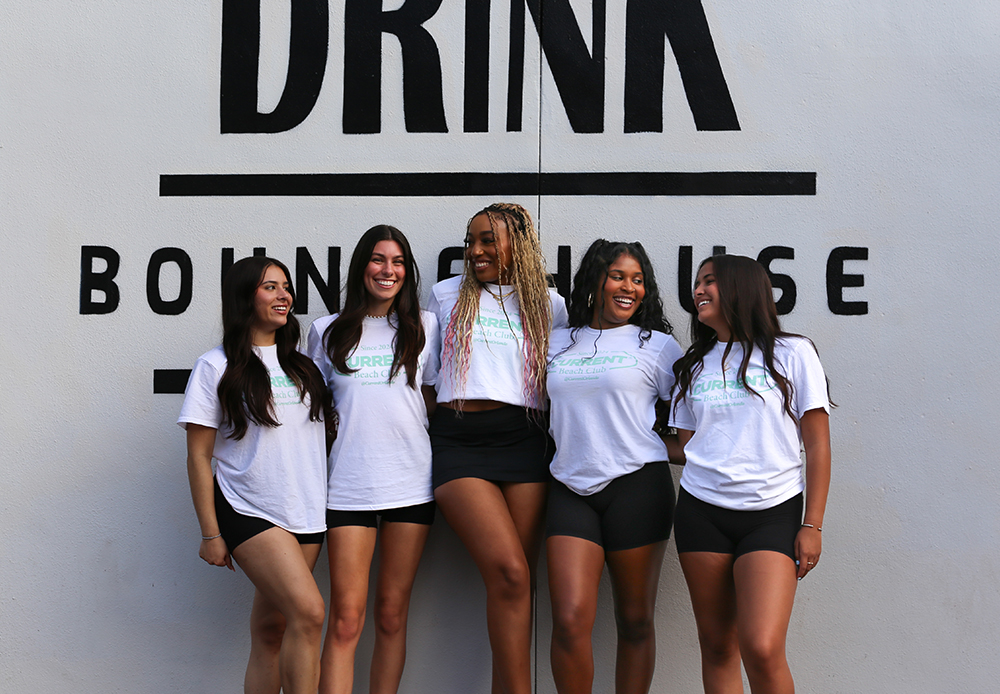 group of friends with current orlando shirts